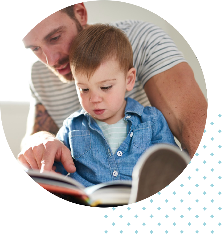 dad reading to son